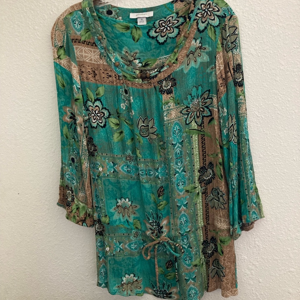 Pretty print three quarter sleeve rayon blouse.
